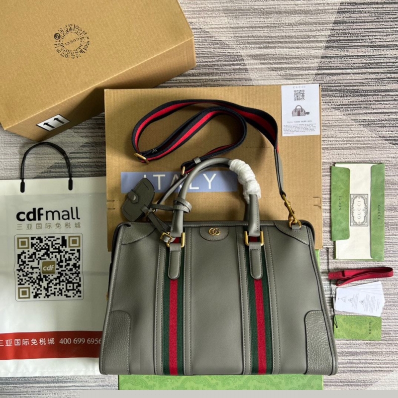 G*u*i top handle bags